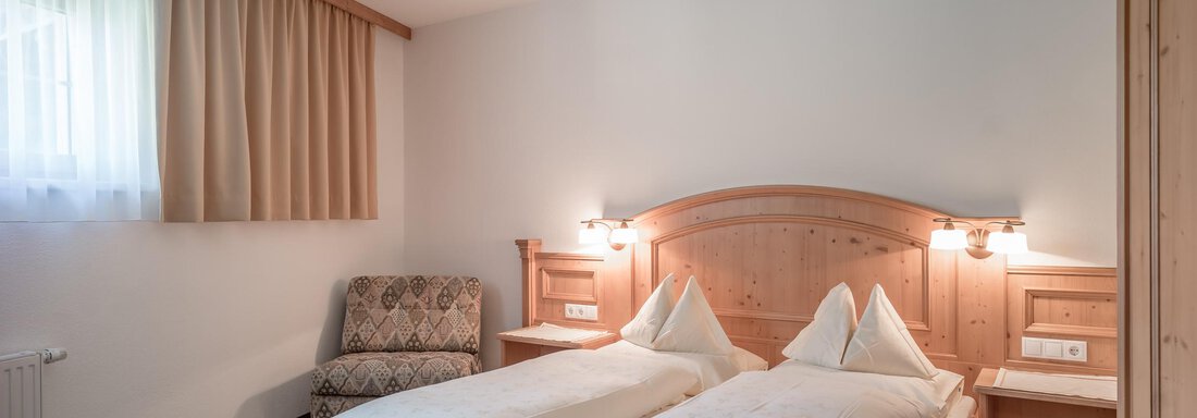 Schlafzimmer - Ferienwohnung de Luxe Alpenresidenz am Mühlbach - Obergurgl 